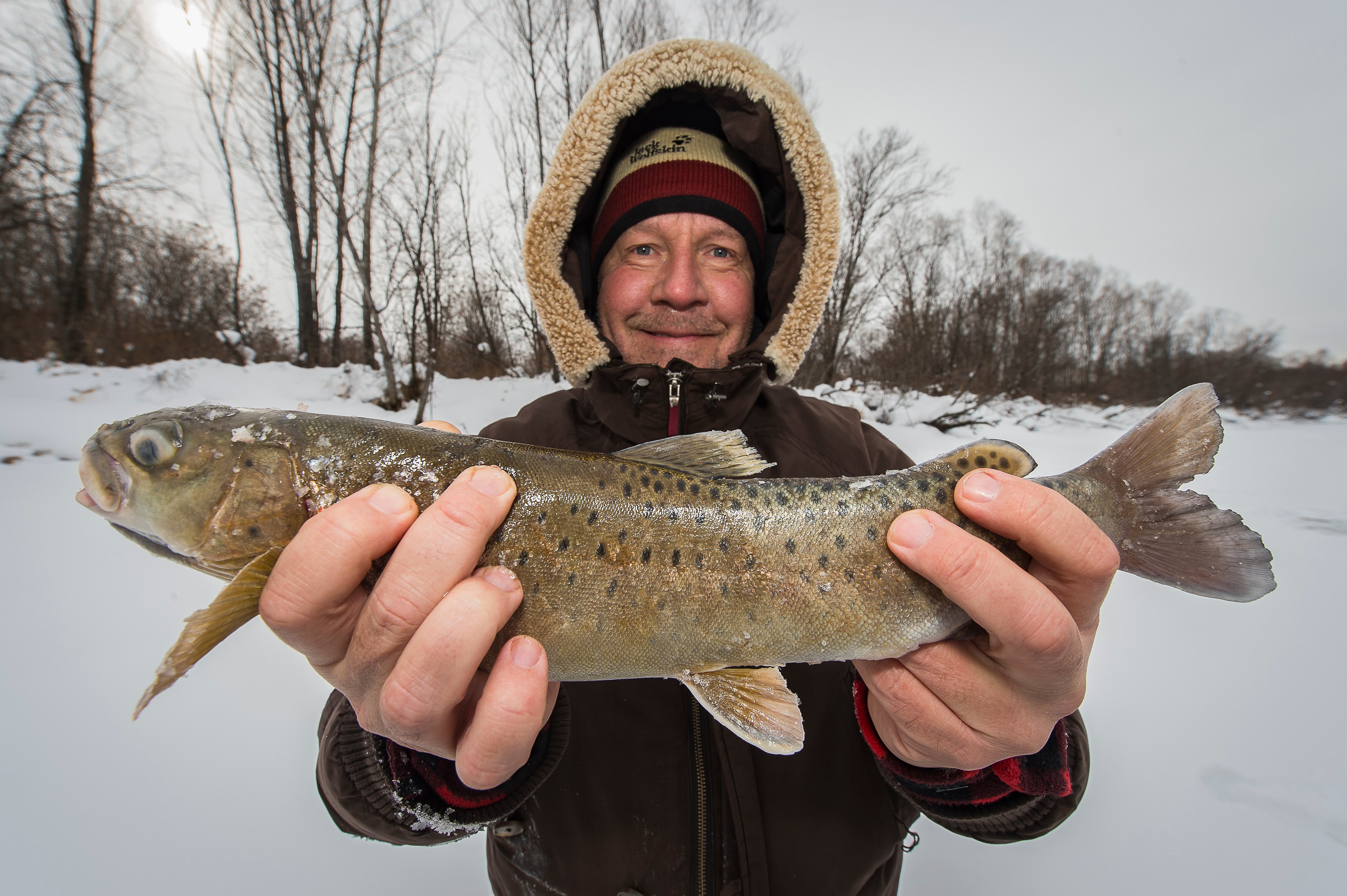 Happy angler on Amur river, Russia © Ola Jennersten _ WWF-Sweden